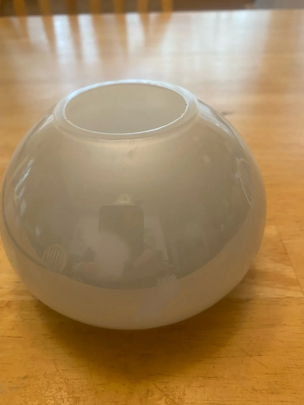 Crate & Barrel Pearlized light green glass globe vase about 5x3